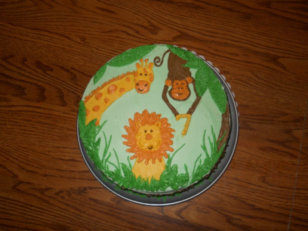 Cake with cartoon jungle animals