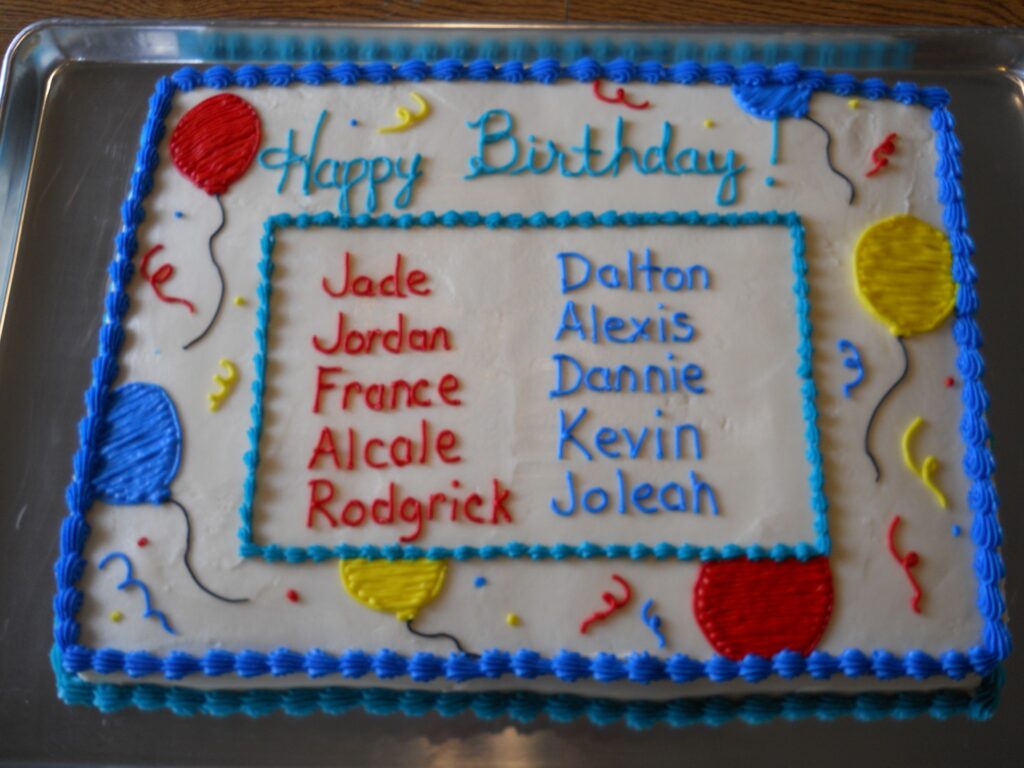 Birthday month sheet cake with 10 names